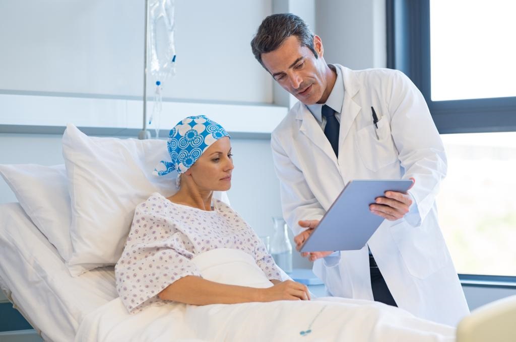Seleção de pacientes com linfonodo positivo para redução do estadiamento axilar com quimioterapia neoadjuvante